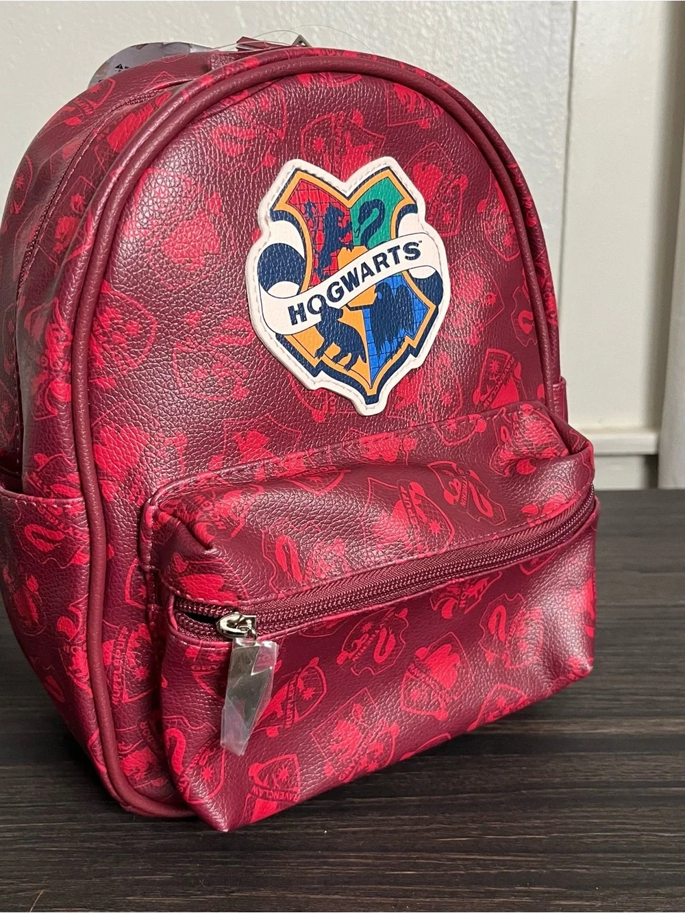 Maroon red faux leather Harry Potter Hogwarts mini backpack ft crest applique